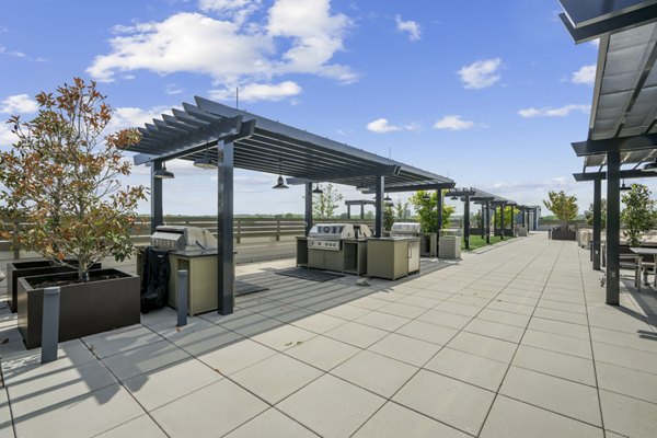 fire pit/patio at The Park at Woodbridge Station Apartments