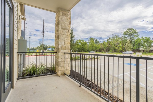 Cadence Creek at Gosling Apartments: Cozy patio with seating and greenery for relaxation