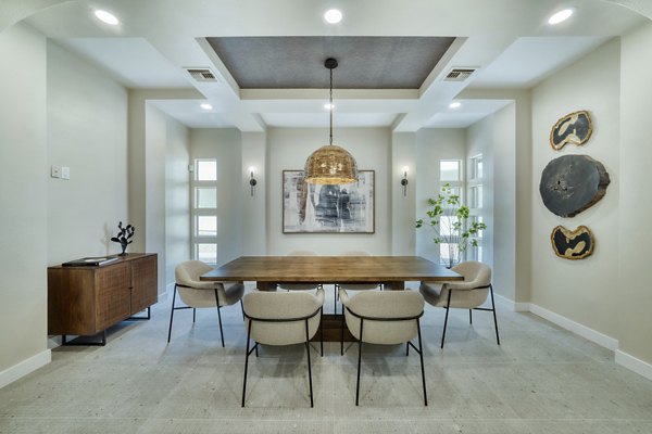 Meeting facility at Mountainside Apartments featuring modern seating and audiovisual equipment