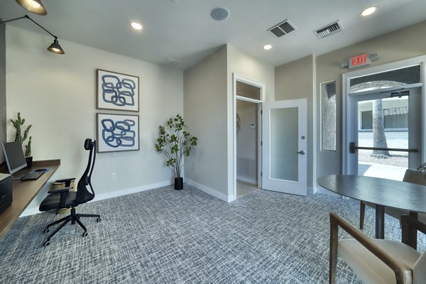 Mountainside Apartments: Sleek business center with modern workstations and high-speed internet in scenic luxury community