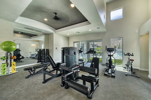 Modern fitness center with state-of-the-art equipment at Mountainside Apartments for luxury living and active lifestyle