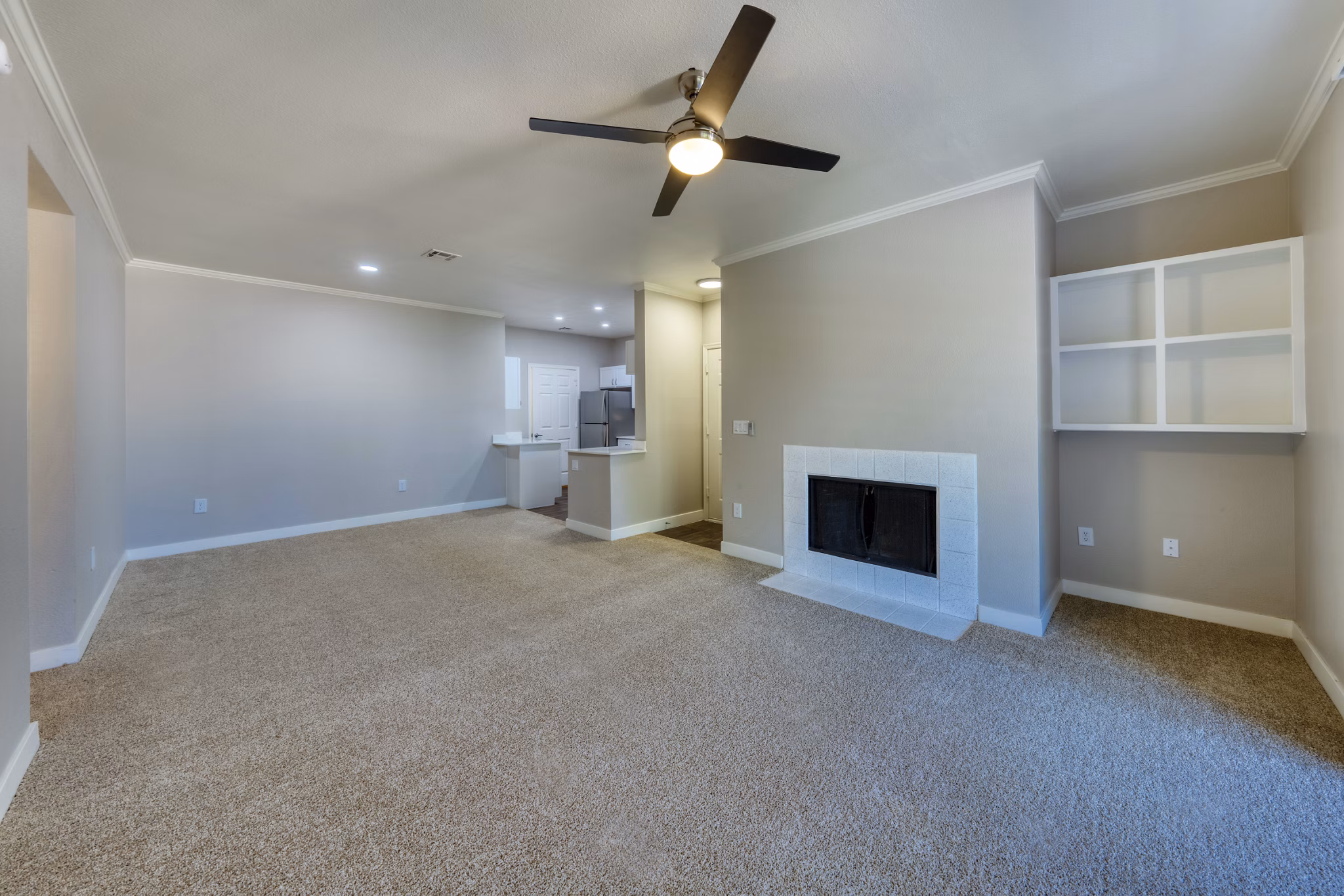 Spacious living room with mountain views in Mountainside Apartments, luxury property