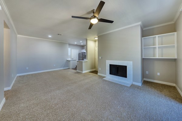 Spacious living room with mountain views in Mountainside Apartments, luxury property