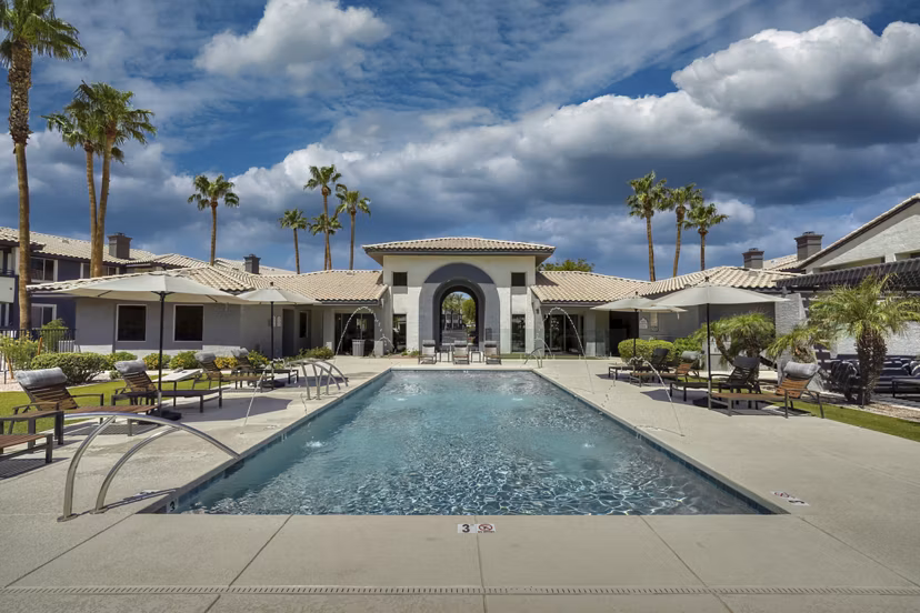 Scenic outdoor pool area at Mountainside Apartments offering luxury amenities and a peaceful retreat