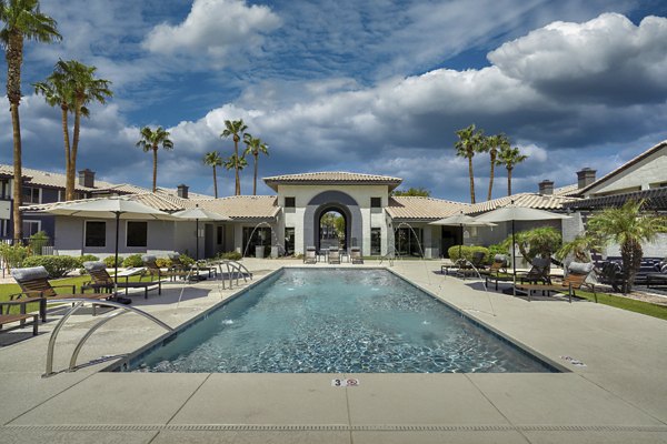 Scenic outdoor pool area at Mountainside Apartments offering luxury amenities and a peaceful retreat