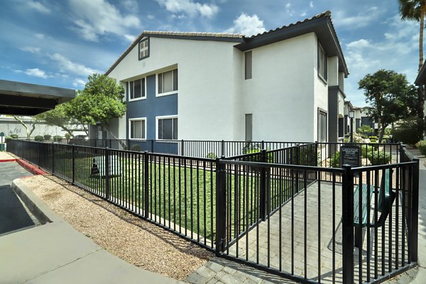 Expansive dog park with agility equipment at Mountainside Apartments, ideal for pet-friendly living