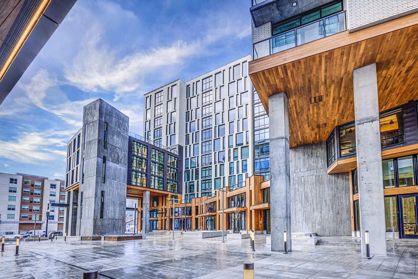 The Charles Apartments: Modern luxury apartment building in vibrant cityscape