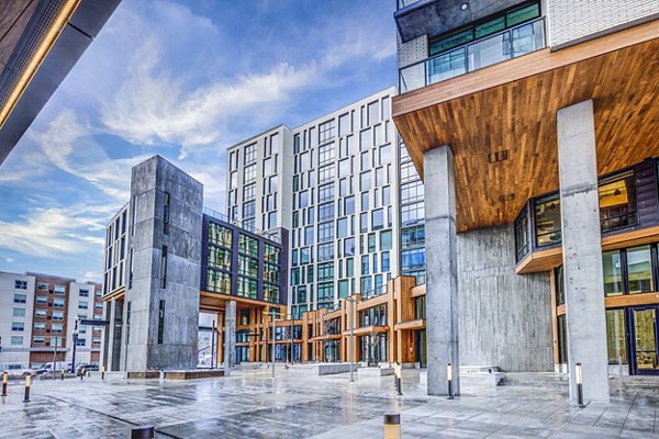 The Charles Apartments: Modern luxury apartment building in vibrant cityscape