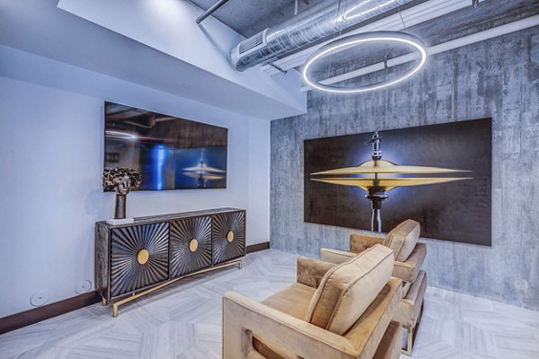 Modern clubhouse with contemporary design at The Charles Apartments in Charlotte, perfect for community gatherings and social events