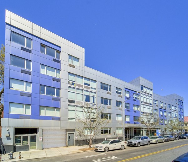 1209 Dekalb Apartments: Luxurious view of modern apartments offering premium urban living