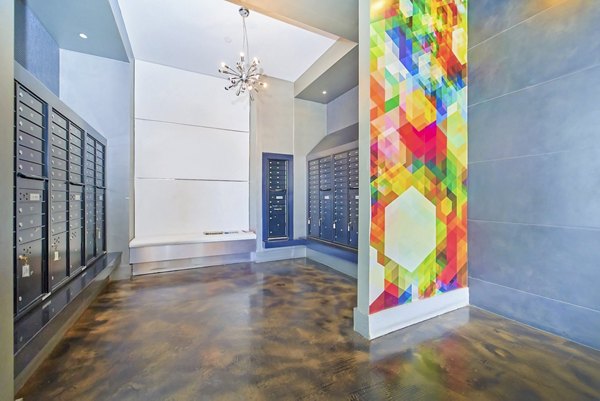 Spacious clubhouse lobby featuring contemporary design at 1209 Dekalb Apartments
