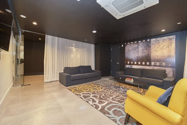 Elegant clubhouse lobby with contemporary decor at 1209 Dekalb Apartments