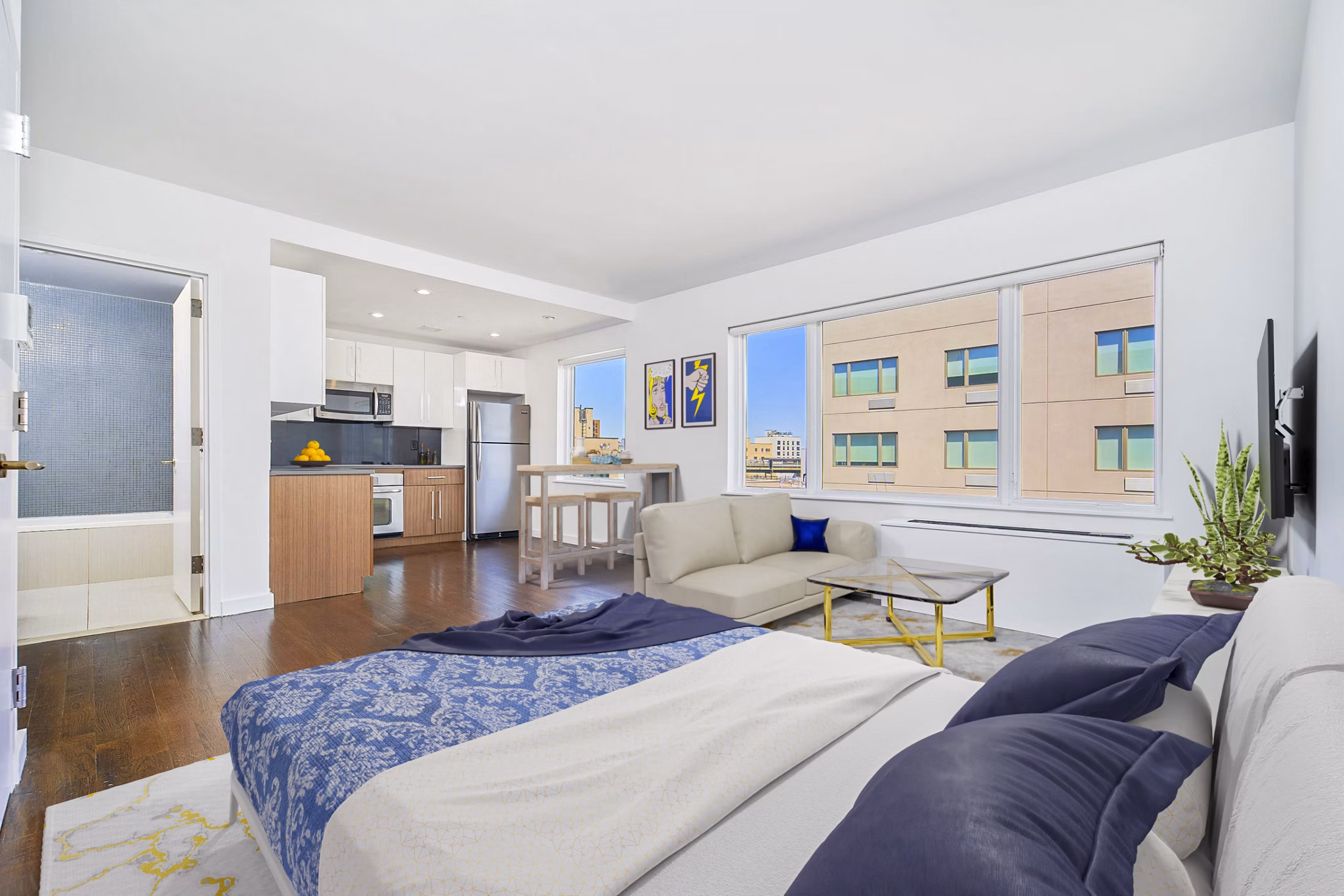 Studio living room with modern furnishings and bright decor at 1209 Dekalb Apartments, luxury apartments by Greystar in Brooklyn