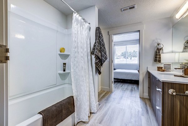 Bathroom featuring modern fixtures and sleek design in Bravada 193 Apartments