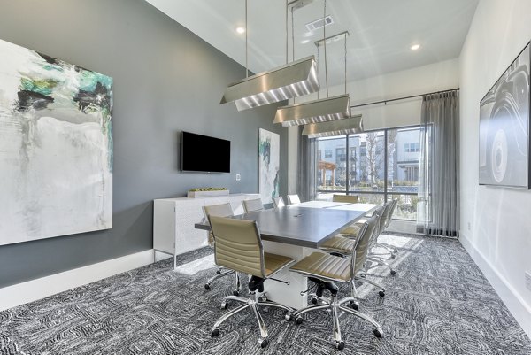 Modern meeting facility with advanced AV equipment at Moderno Apartments