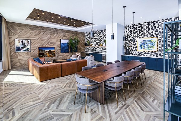 Elegant clubhouse with contemporary design elements at Fallyn Apartments, offering luxury social spaces for residents