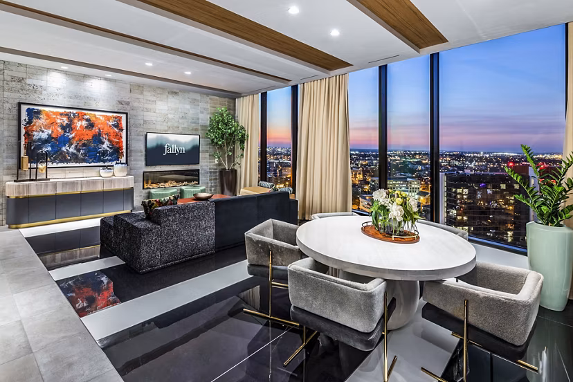 Modern clubhouse with stylish seating and billiards at Fallyn Apartments