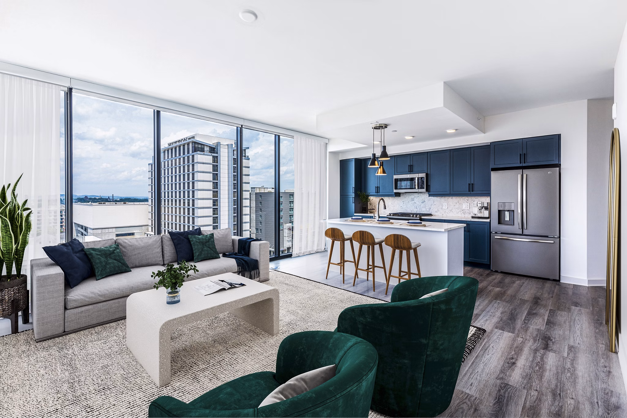Spacious living room with modern decor in Fallyn Apartments featuring luxury amenities