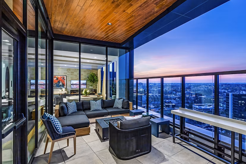 Balcony with scenic view at Fallyn Apartments: luxury outdoor space for relaxing and entertaining in a modern community