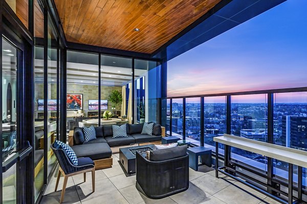 Balcony with scenic view at Fallyn Apartments: luxury outdoor space for relaxing and entertaining in a modern community