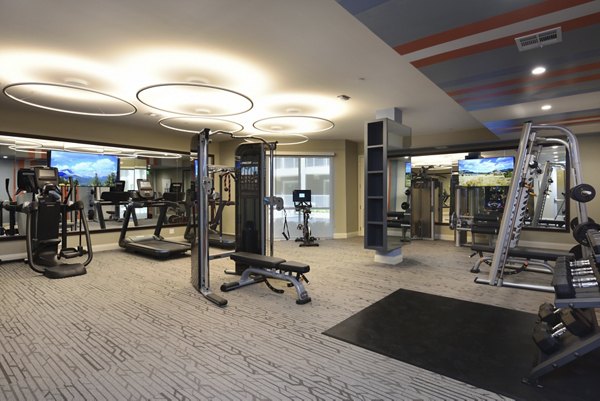 State-of-the-art fitness center with modern equipment at The Flats at West Alabama Apartments