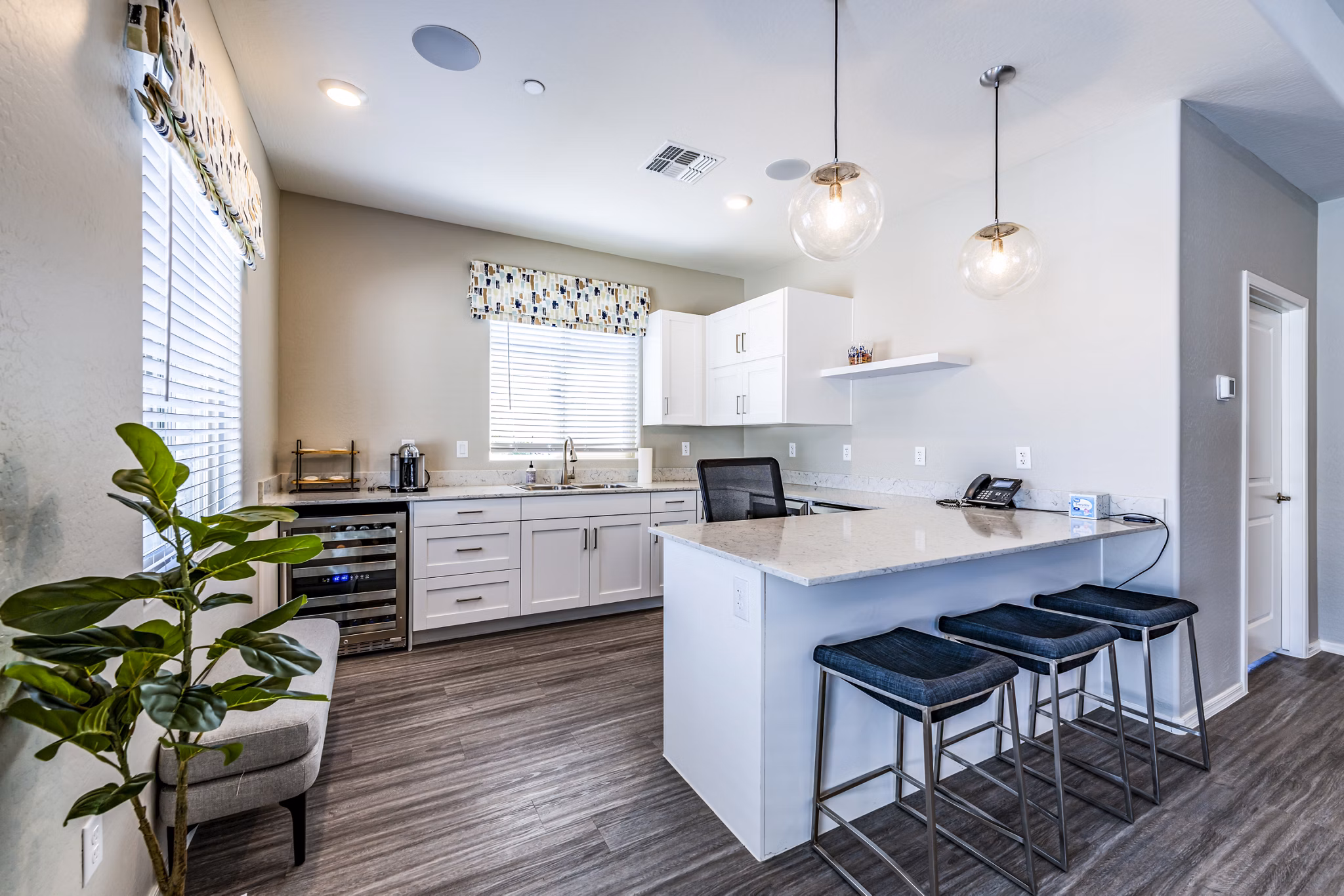 Vlux at Queen Creek Apartments: Clubhouse lobby with modern seating and decor elements for luxury living