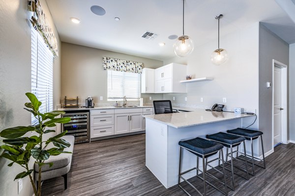 Vlux at Queen Creek Apartments: Clubhouse lobby with modern seating and decor elements for luxury living