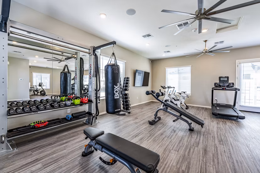 Fitness center with state-of-the-art equipment at Vlux at Queen Creek Apartments
