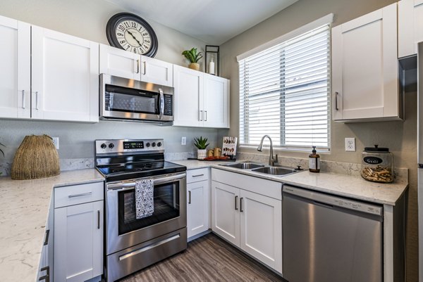 kitchen at Vlux at Queen Creek Apartments