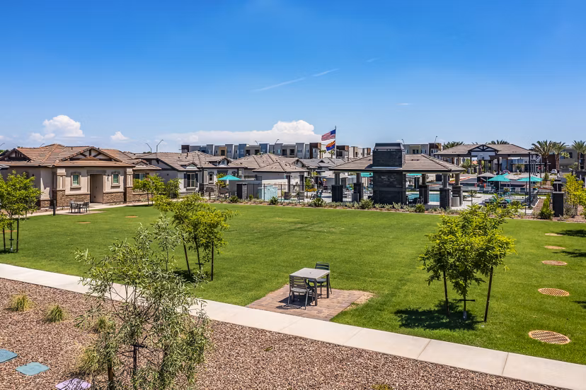 Courtyard view with modern seating and greenery at Vlux at Queen Creek Apartments, offering luxury living experiences