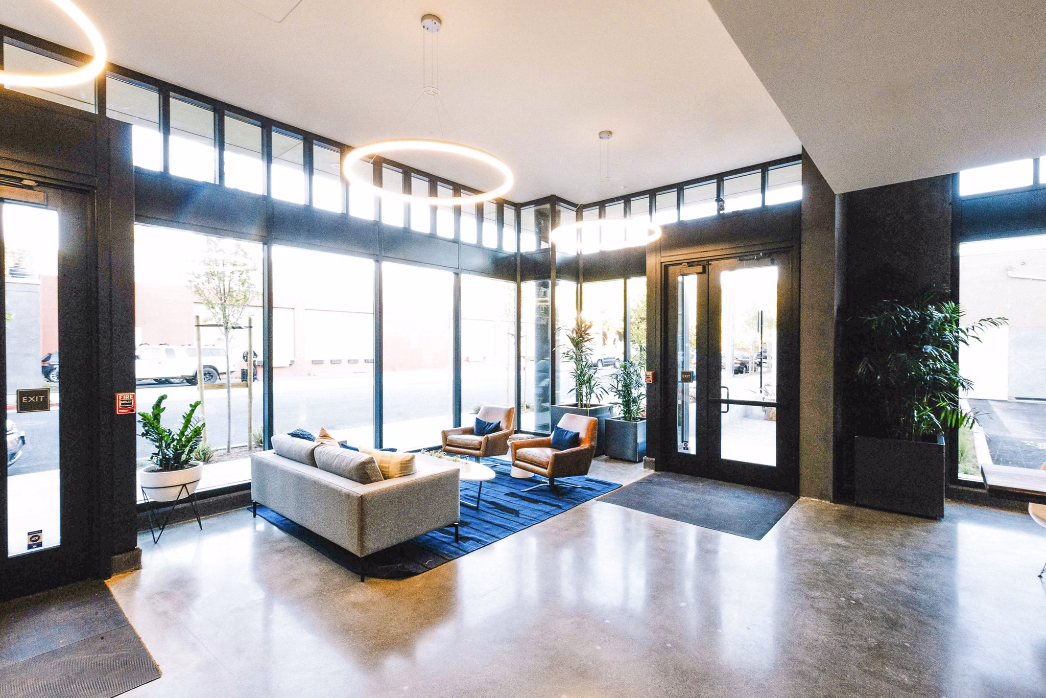 Elegant clubhouse lobby with modern dÃ©cor at Aquatic I Apartments, showcasing luxury living in a welcoming community space