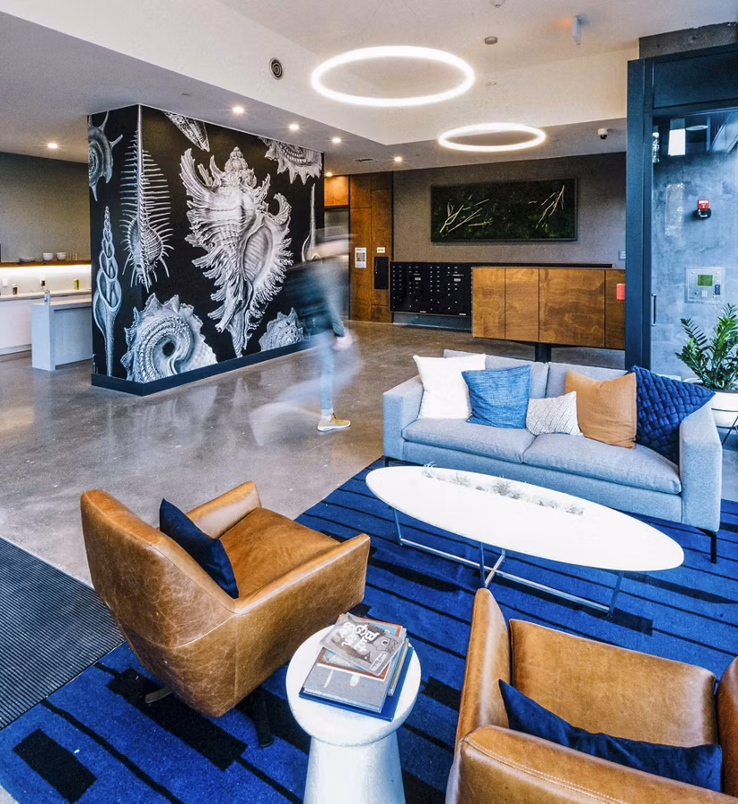 Modern clubhouse with stylish lobby at Aquatic I Apartments