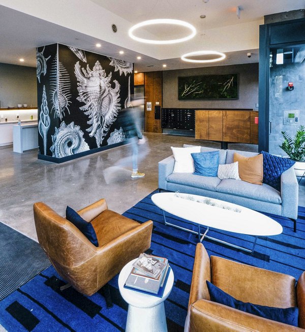 Modern clubhouse with stylish lobby at Aquatic I Apartments