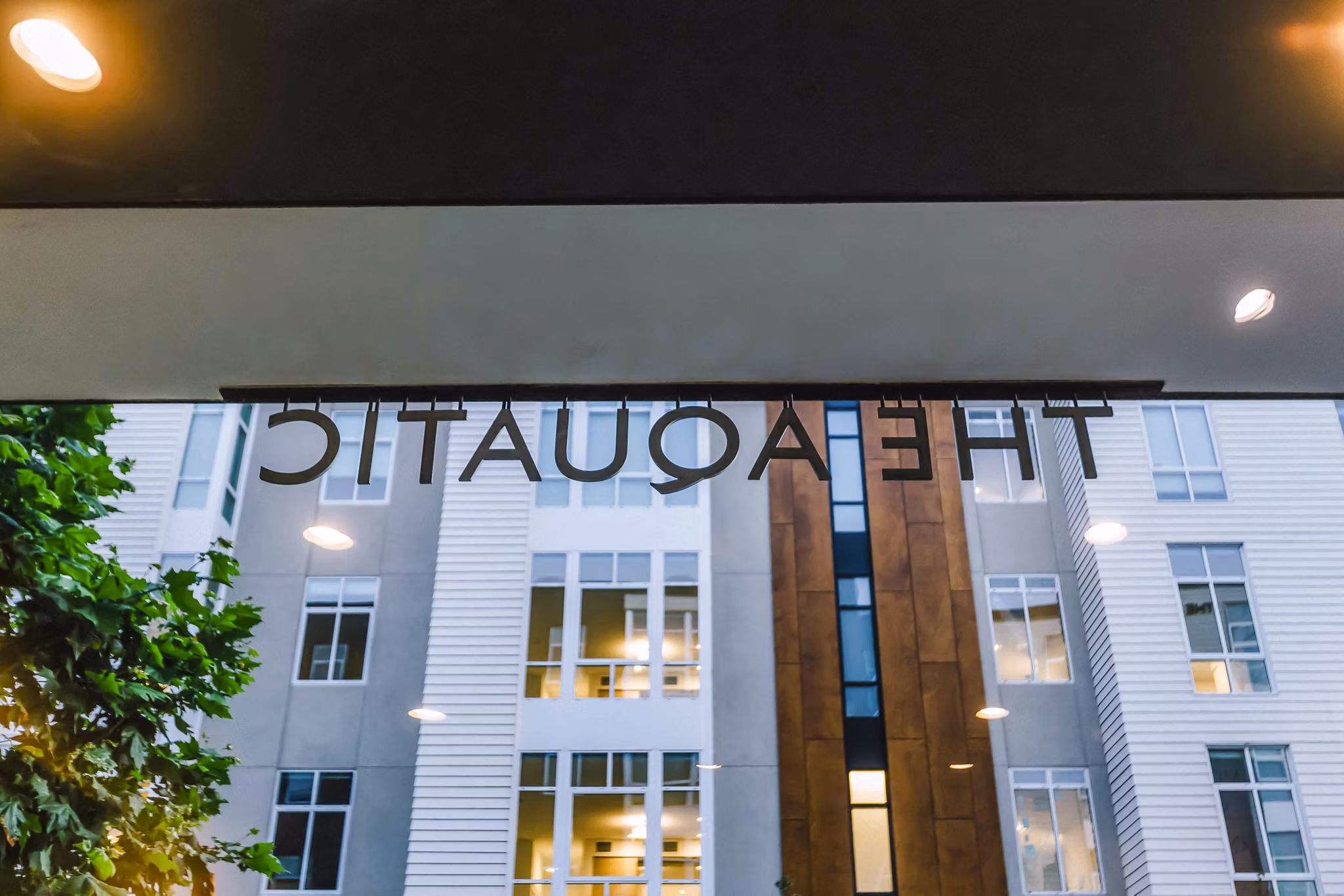 Modern clubhouse lobby with sleek decor at Aquatic I Apartments, offering luxury amenities for residents