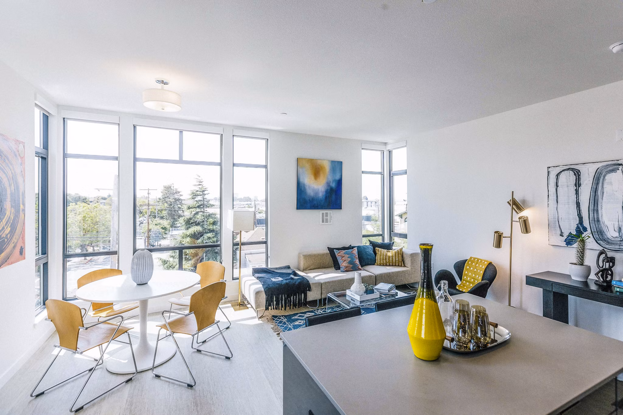 Dining room with modern decor and sleek furniture at Aquatic I Apartments