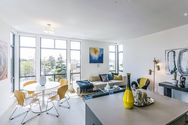Dining room with modern decor and sleek furniture at Aquatic I Apartments