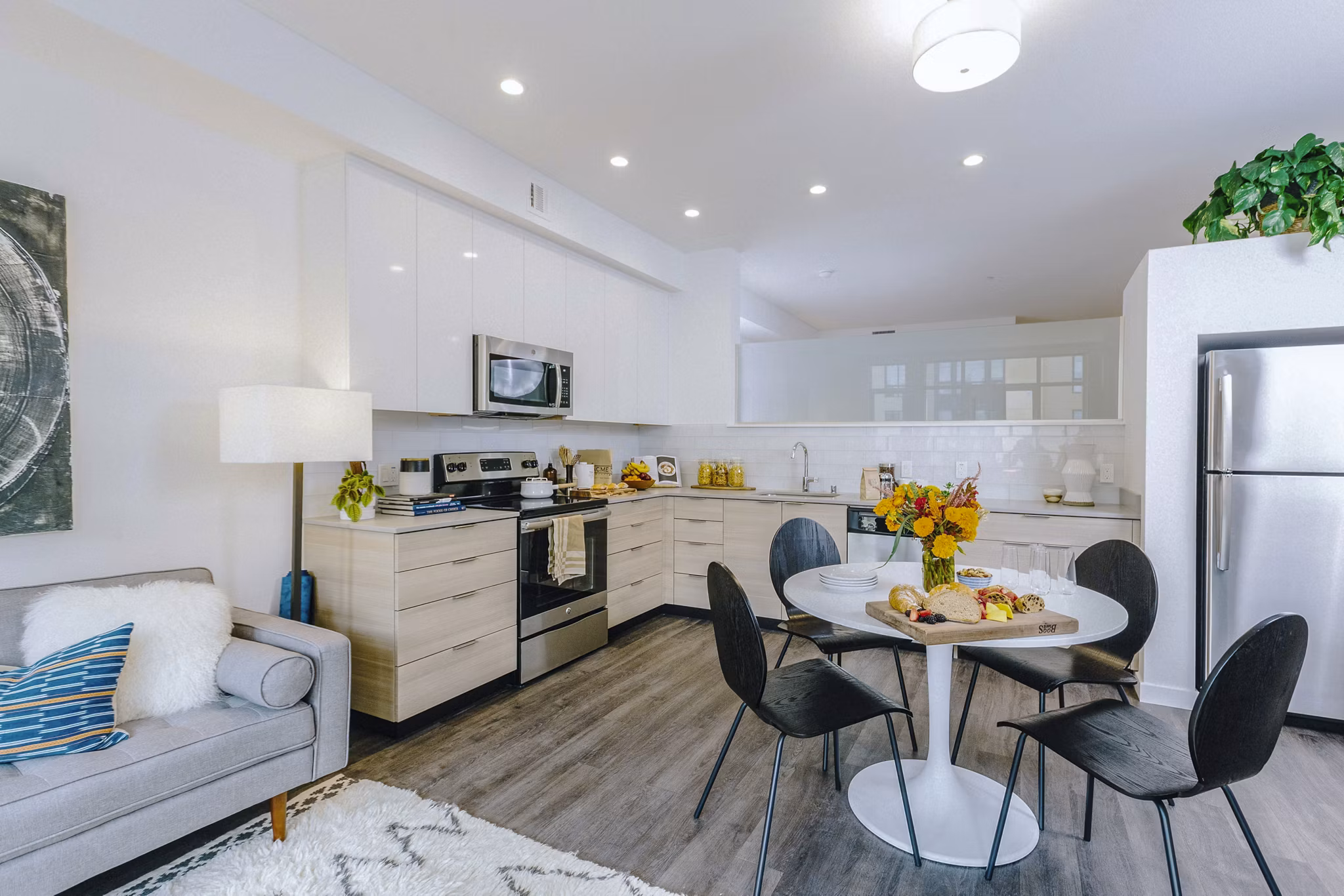 Sleek modern kitchen with stainless steel appliances at Aquatic I Apartments
