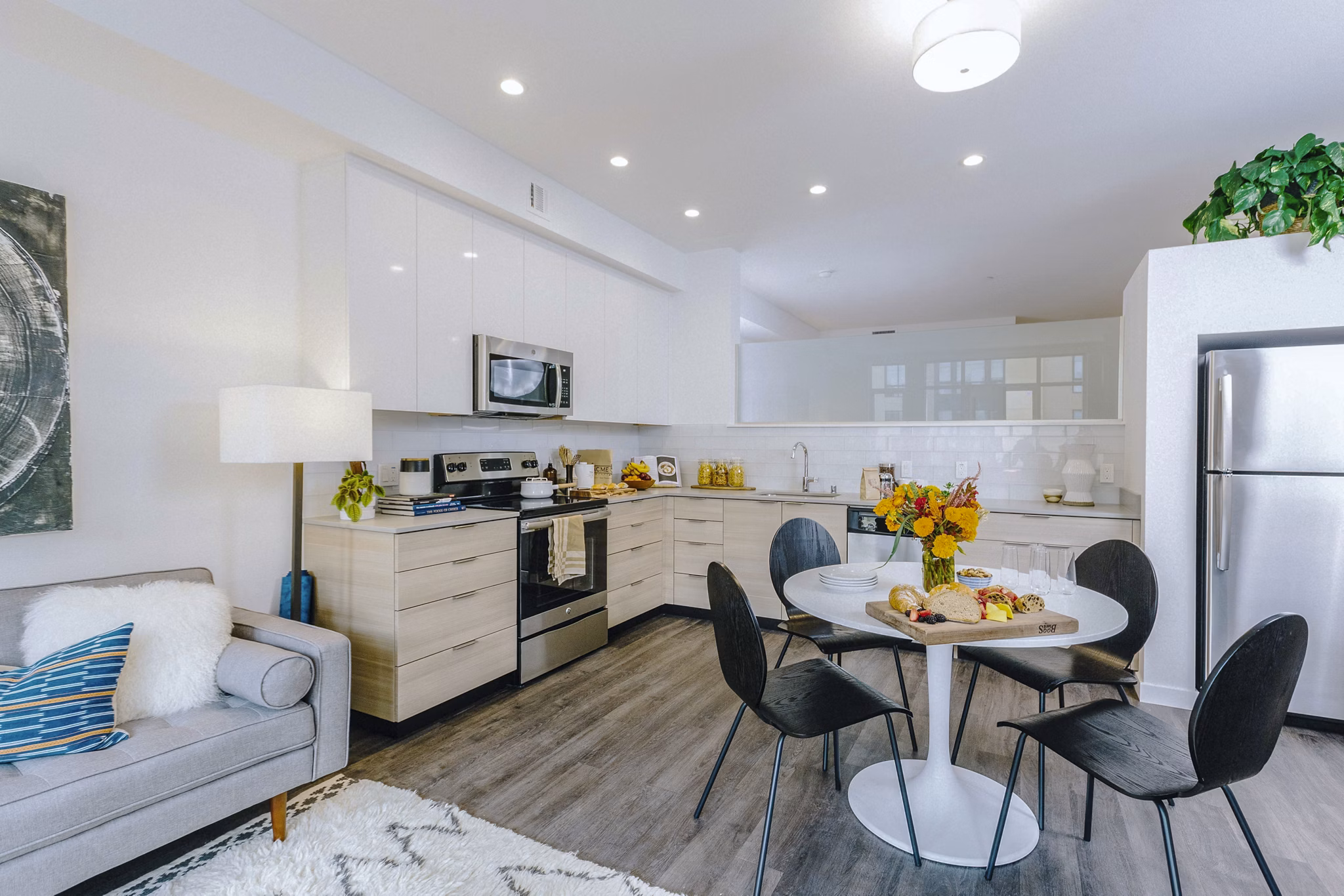 Sleek modern kitchen with stainless steel appliances at Aquatic I Apartments