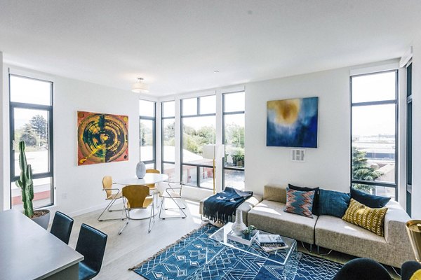 Spacious living room with modern decor at Aquatic I Apartments
