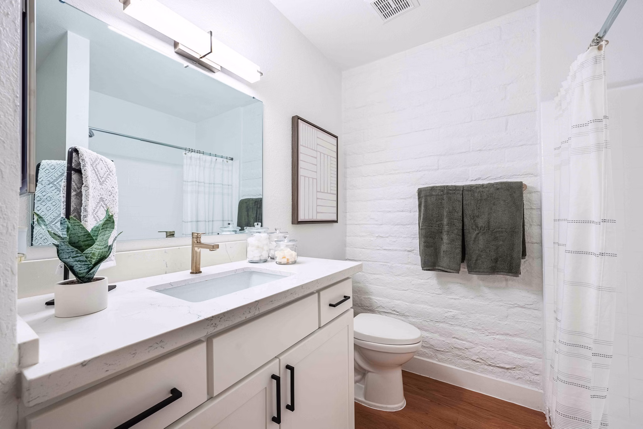 Modern bathroom with sleek fixtures at La Privada Apartments