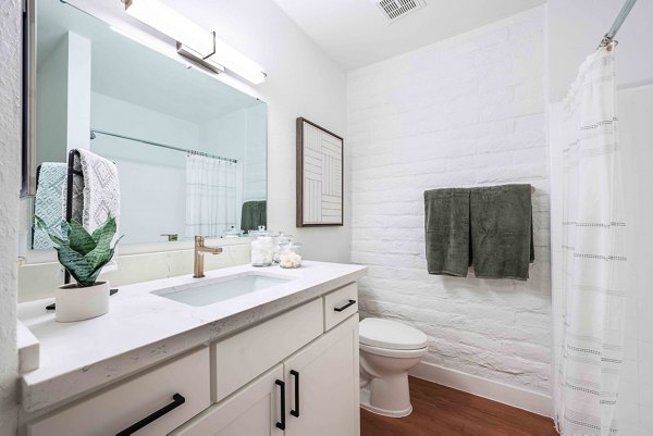 Modern bathroom with sleek fixtures at La Privada Apartments