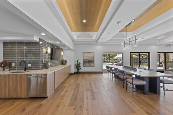 La Privada Apartments: Modern clubhouse with stylish seating and entertainment areas