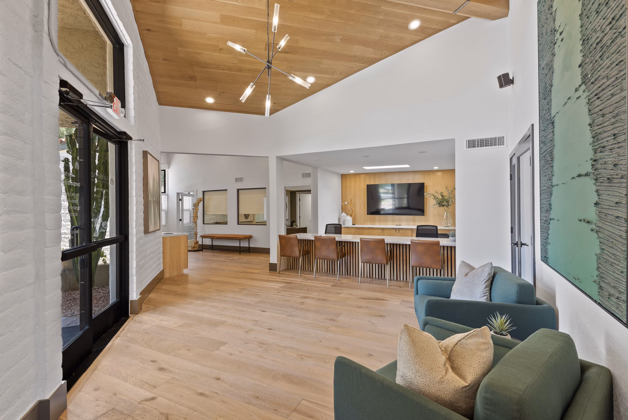 Clubhouse with modern amenities at La Privada Apartments, luxury living by Greystar in a vibrant community setting