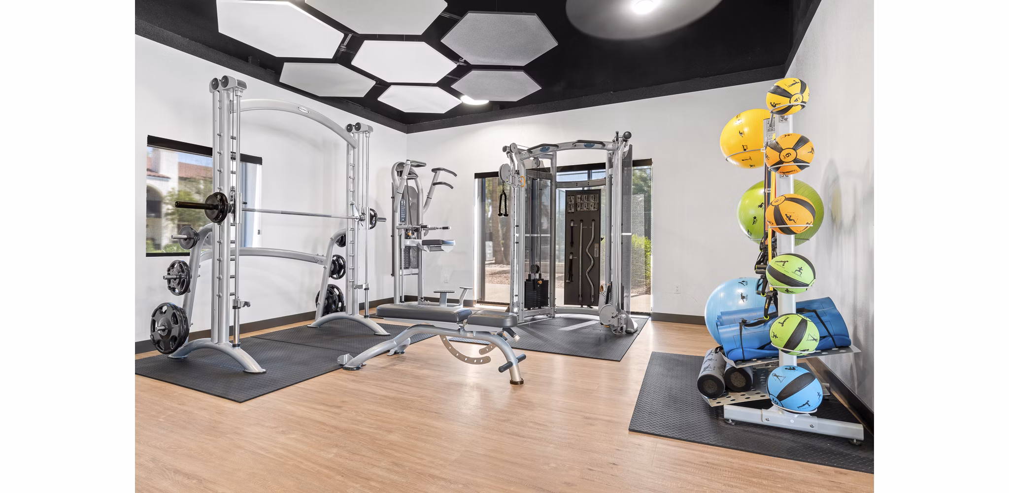 Fitness center with modern equipment at La Privada Apartments