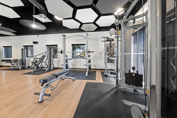 Modern fitness center featuring top equipment at La Privada Apartments