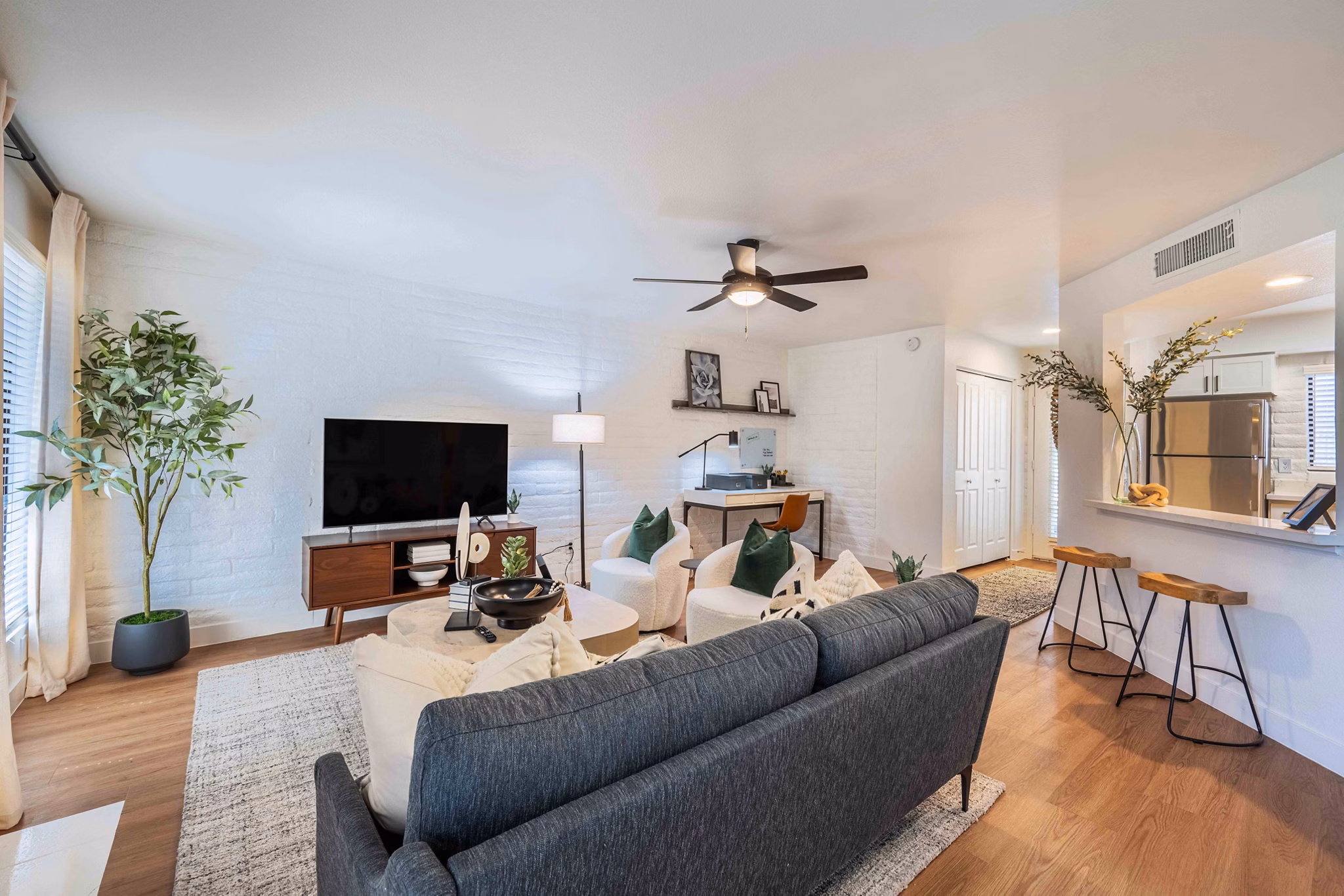 Modern living room with stylish decor at La Privada Apartments