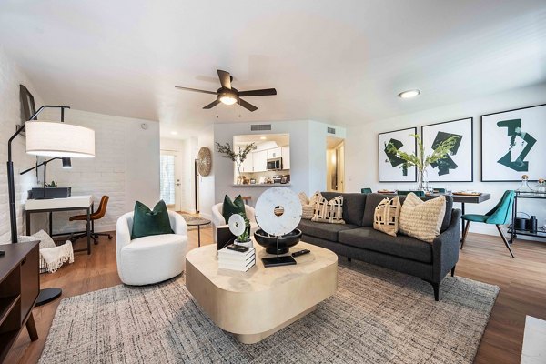 Spacious living room with contemporary decor in La Privada Apartments, a luxury Greystar residence