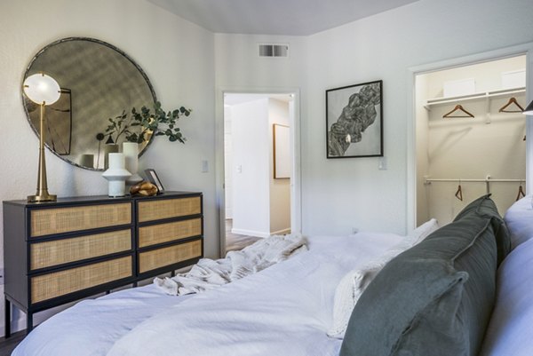 Cozy bedroom with modern decor at The Aubry Apartments