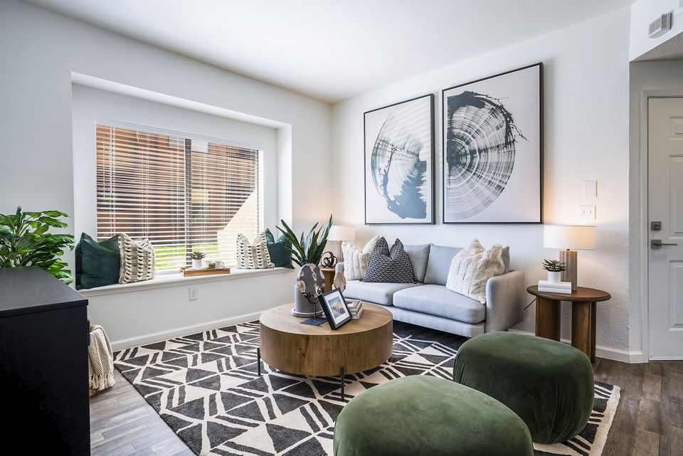 Contemporary living room featuring stylish furniture at The Aubry Apartments