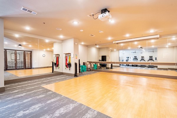 Yoga and spin studio with modern equipment at Larkspur at Twin Creeks Apartments